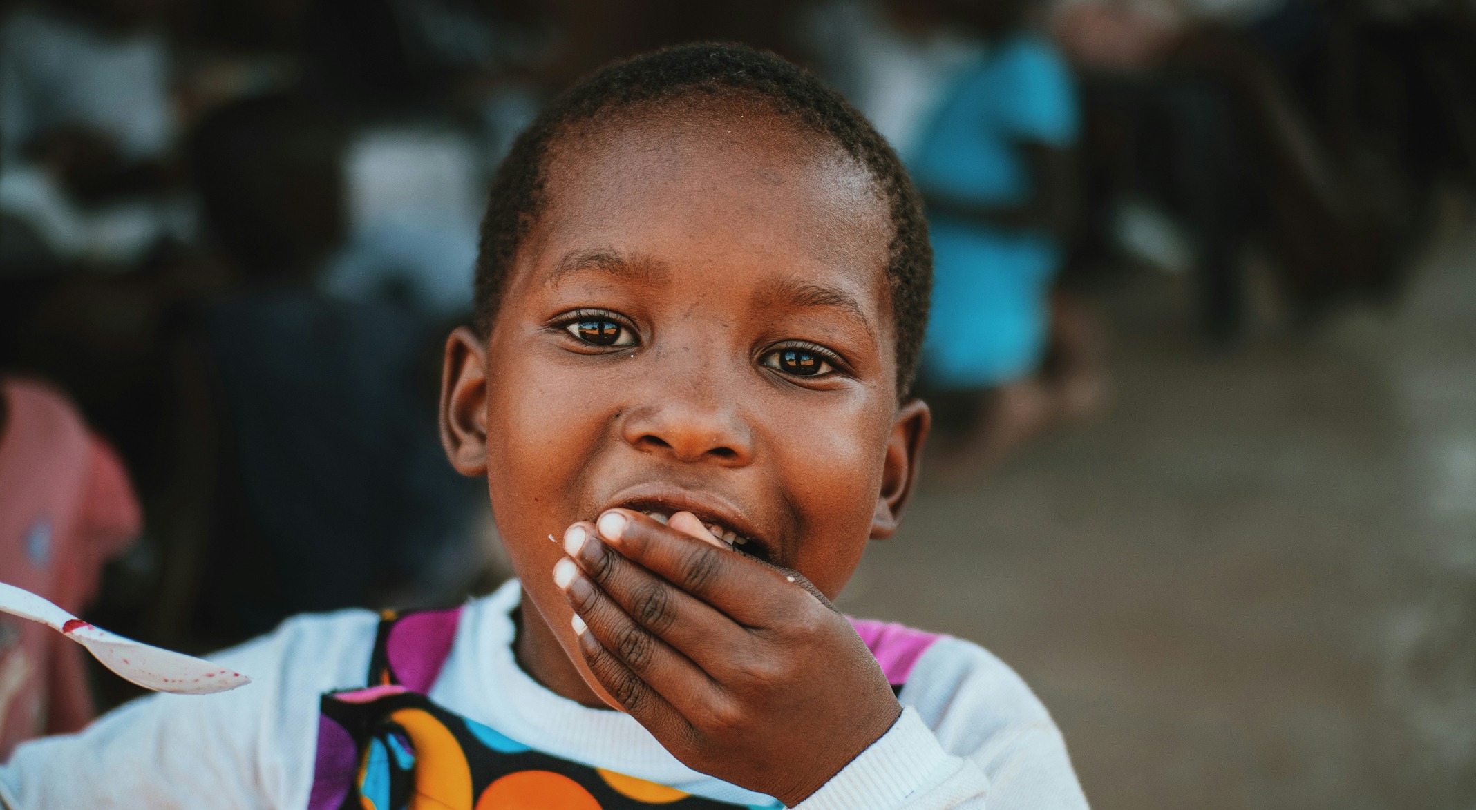 Photographie : Gros plan d'une enfant qui mange